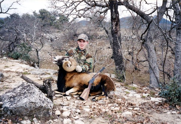 a photo of me with my Corsican Ram showing off his horns